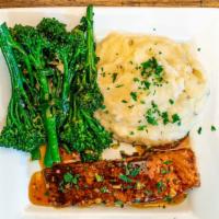 Blackened Salmon · With garlic mashed potatoes and lemon scented broccolini.