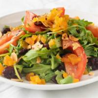 House Salad · Fresh Spring Greens and Baby Arugula w/ Slivered Almonds, dried Cranberries, Feta & Fig Glaze