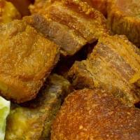 Porcion De Chicharron · Fried pork belly.