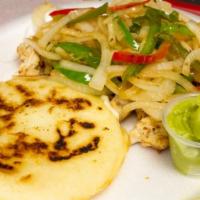 Pincho De Pollo · Grilled chicken, arepa with cheese, sauteed onion peppers and guacamole.