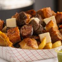 Super Picada · French fries, criollas potatoes, grilled beef and chicken, chopped sausage, fried pork belli...