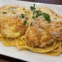 Chicken Francese · Egg battered chicken, lemon butter wine sauce.