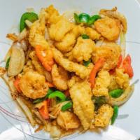 Salt N Pepper Trio · Shrimp, calamari & flounder fillet tossed in a high flamed wok with special seasoning, red b...