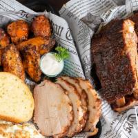Holy Grill Feast · Ten ounce of pork loin, rack of six bbq ribs, six bbq wings, two potato salad, two Texas toa...