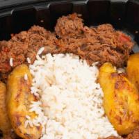 Ropa Vieja · Shredded brisket with sofrito, rice & baked plantains.