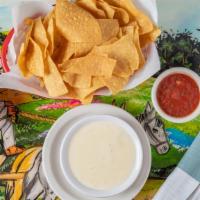 Cheese Dip · Our homemade monterey jack cheese dip with a touch of jalapeno.