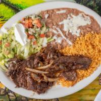 Carne Asada · A thin sliced steak seasoned and cooked to perfection.