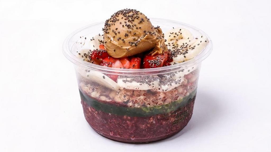 Pb & Açaí Bowl · Acai bowl topped with granola, Peanut Butter, Banana, Strawberries, and Chia Seeds