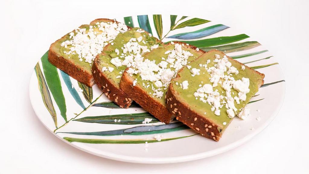 Smashed Avo Toast · Smashed Avocado on toasted Whole Wheat Bread topped with Olive Oil, Feta Cheese, Salt & Pepper. Side of fruit or greens included.