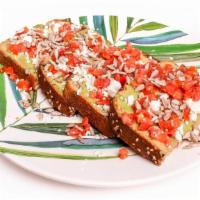 Califlorida Toast · Smashed avocado on toasted Whole Wheat Bread topped with Sunflower Seeds, Balsamic Tomatoes,...