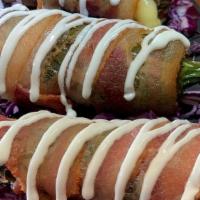 Jalapeños Rellenos Of Cheese & Rolled In Bacon · The jalapeños are first slightly grilled. Veins and seeds are then taken out (so that the ja...