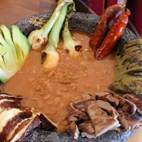 Molcajete Mixed (Arrachera Steak & Chicken) · This dish is large enough to share, for two adults.  A combination of arrachera (which is ve...