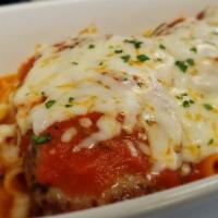 Veal Parmigiana · Veal breaded, marinara sauce, mozzarella and parmesan cheese