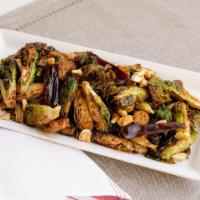 Kung Pao Brussels Sprouts · 350 cal. chicken sausage, sweet soy, chile de arbol, toasted peanuts