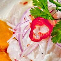 Ceviche De Pescado / Fish Ceviche · Is a seafood dish made up to fresh, cubed raw fish or shellfish marinated or cooked in a lar...
