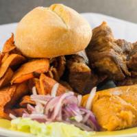 Desayuno Lurin · Deep fried pork, tamale, fried sweet potato, salsa criolla, and bread