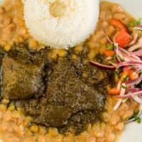 Seco De Res Con Frijoles · Beef in cilantro sauce with rice & beans