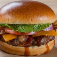 Texas Smokehouse Burger · 1/4lb Angus Burger with Honey Q, Applewood Bacon & Cheddar Cheese