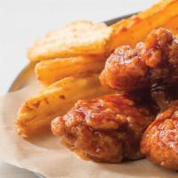 4 Boneless Wings · Includes Wedge Fries or Kettle Chips or Carrots/Celery & a Juice Box