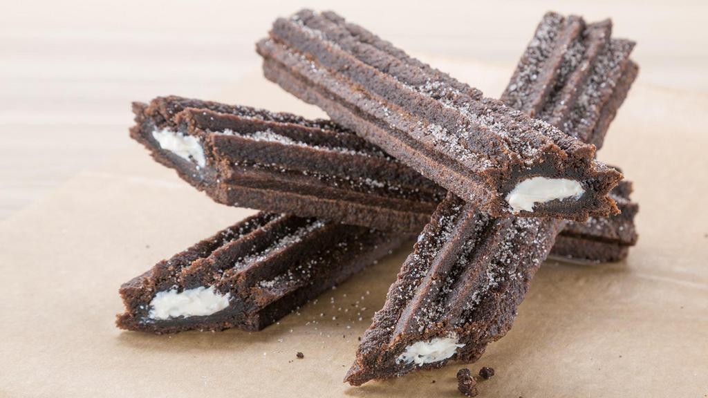 Oreo Churros · The famous cookies are now available as a melt-in-your-mouth chocolatey churro