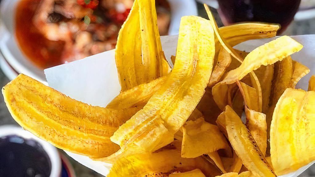 Mariquitas · Plantain chips served with garlic mojo sauce.