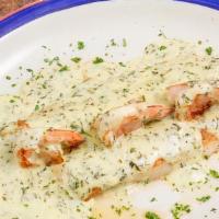 Filete De Pescado En Salsa Verde · Fish filet of the day topped with jumbo shrimps and our parsley cream sauce.