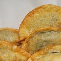 Fried Dumplings (6Pc) · Fried dumplings contain a mix of vegetables, beef, and pork.