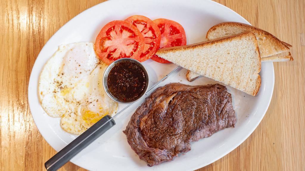 Steak 'N Eggs · Two eggs, house-made steak sauce, and your choice of side. Served with biscuit or toast.
