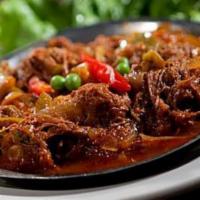 Ropa Vieja · An old cuban favorite! Shredded beef stewed slowly in a spanish sauce with fresh peppers, to...