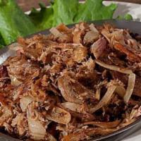 Lechon Asado Con Cebolla · Tender pieces of roast pork, pulled and grilled with fresh sautéed onions and a touch of hav...
