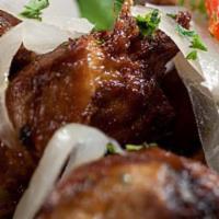 Masitas De Puerco Fritas · Tender chunks of pork marinated in havana’s signature mojo sauce, deep fried and topped with...