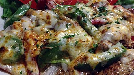 Pollo Primavera · Grilled boneless chicken breast topped with fresh peppers, mushrooms, onions and melted mozzarella cheese.