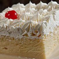 Tres Leches · Our award winning homemade white cake drenched in fresh milk, evaporated and condensed milk ...