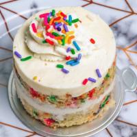 Vanilla Funfetti Cake · Two layers of vanilla cake with rainbow sprinkles and vanilla mousse.