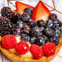 Fruit Tart · Turbinado tart dough, homemade vanilla pastry cream and fresh fruit.