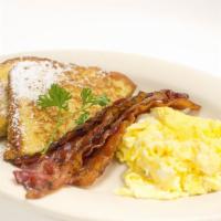 The Royal Breakfast (With 2 French Toast Wedges) · Two eggs, four bacon or sausage links or two sausage patties.