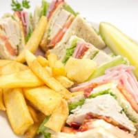 Sky High Club · Turkey, ham, Swiss and American cheese, bacon, lettuce, tomato and mayo with cheese stacked ...