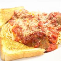 Spaghetti & Meatballs · Three large meatballs in homemade marinara sauce with Parmesan cheese over spaghetti.
