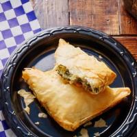 Spanakopita · Flaky filo pastry with spinach and feta cheese