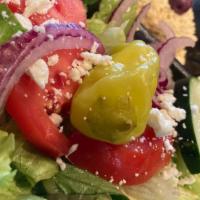 Mini Greek Salad · Lettuce, tomatoes, onions, cucumbers, olive, pepperoncini, and Feta