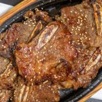 Kalbi · Prime short ribs marinated in house special soy sauce