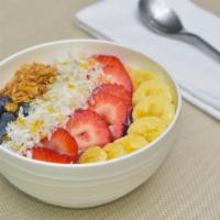 Acai Bowl · Acai, banana, granola, honey, strawberry, and coco flakes.