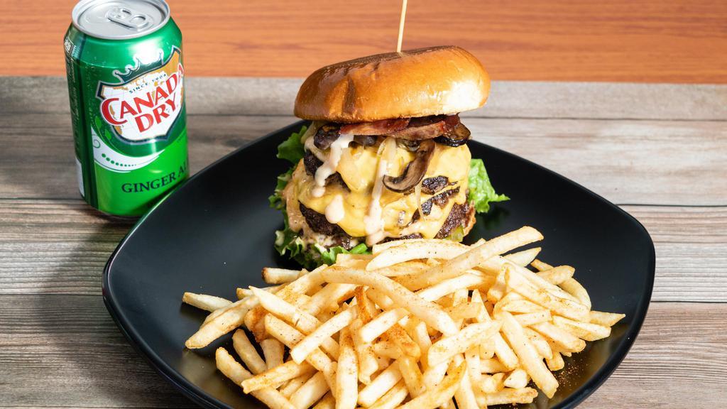 Iii Buddies Signature Burger  · Triple Angus Beef Patty, Lettuce, Tomato, Bacon, Sautéed Onion, Mushroom, Pickles, 3B Sauce, Fries, &  Drinks.