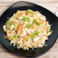 Chicken Fried Rice · Sautéed Shrimp and Chicken Serve with Peas and Carrots, Onion, Scallions, Egg and Thai Jasmi...