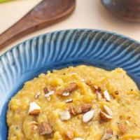 Moong Dal Sheera *H* · A rich sweet lentil delicacy seasoned with spices like nutmeg and cardamom, topped with almo...