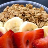 Organic Unsweetened Acai - Classic · topped with granola, banana and strawberry