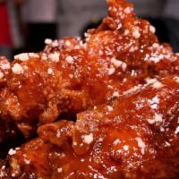 Chicken Wings · 6 Wings tossed in seasoned flour and fried to perfection. With your choice of BBQ, Agave Lem...