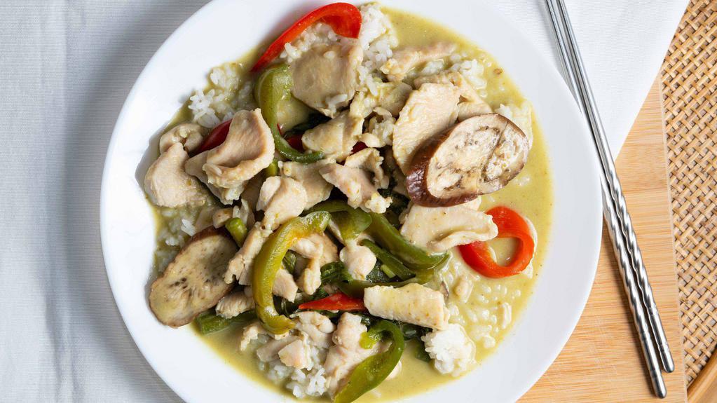 Green Curry · Spicy. Green curry sauce garnished with red bell peppers, green beans and eggplant. With choice of: Chicken, tofu or veggies.
