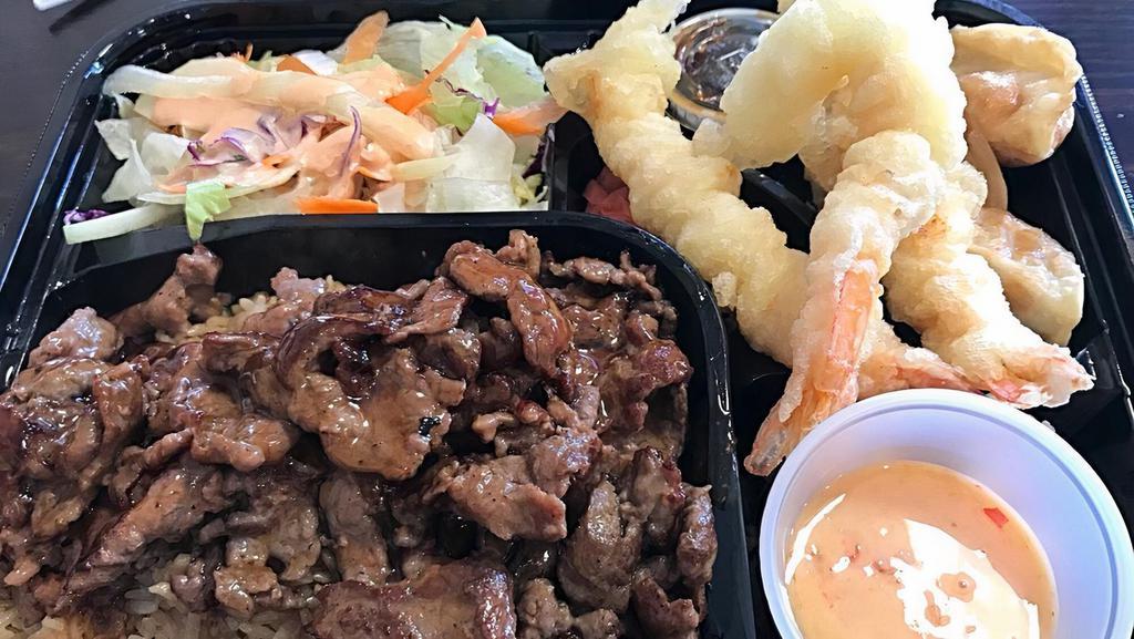 Beef Teriyaki & Shrimp Tempura · Served with garden  salad, 3 dumplings, 3 pieces of shrimps tempura , and 4 pieces of California Roll.