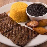 Combo 5: Grilled Steak · 1/2 lb. Two sides included rice, black beans, sweet plantain, salad, or French fries and soda.